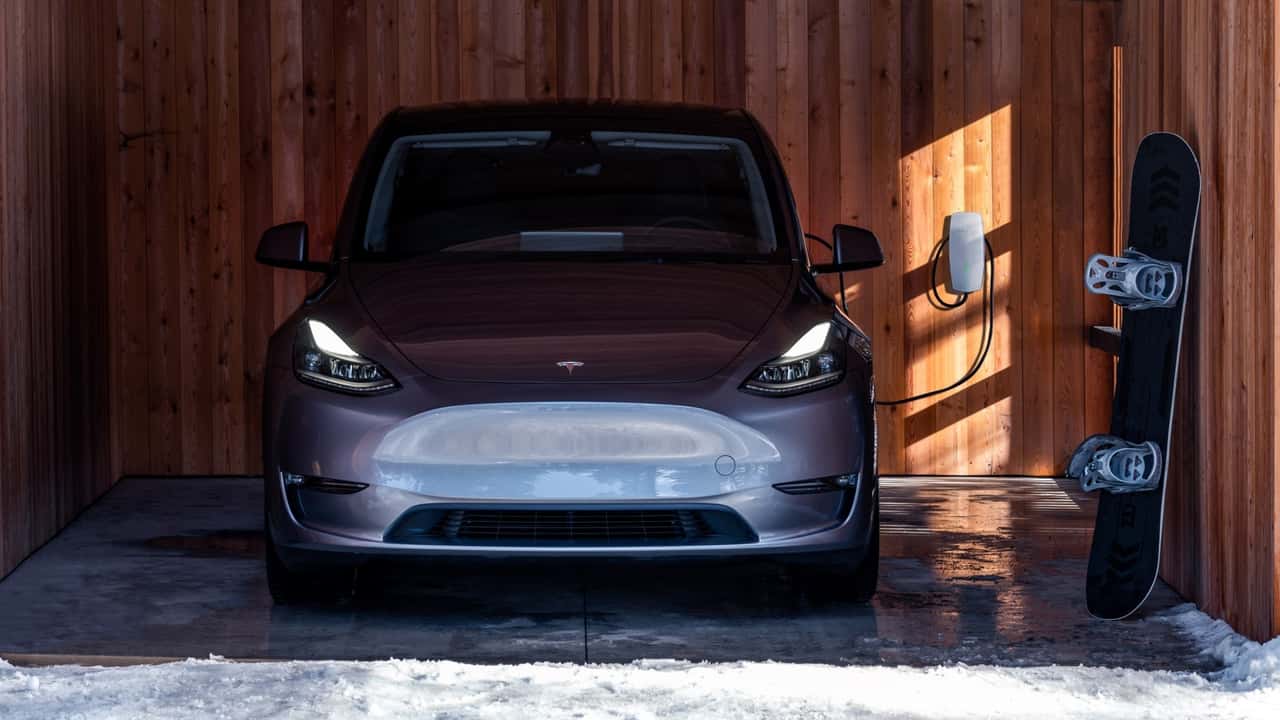 Tesla Model Y charging in garage